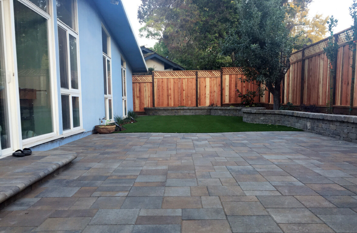 Custom concrete patio design with pavers