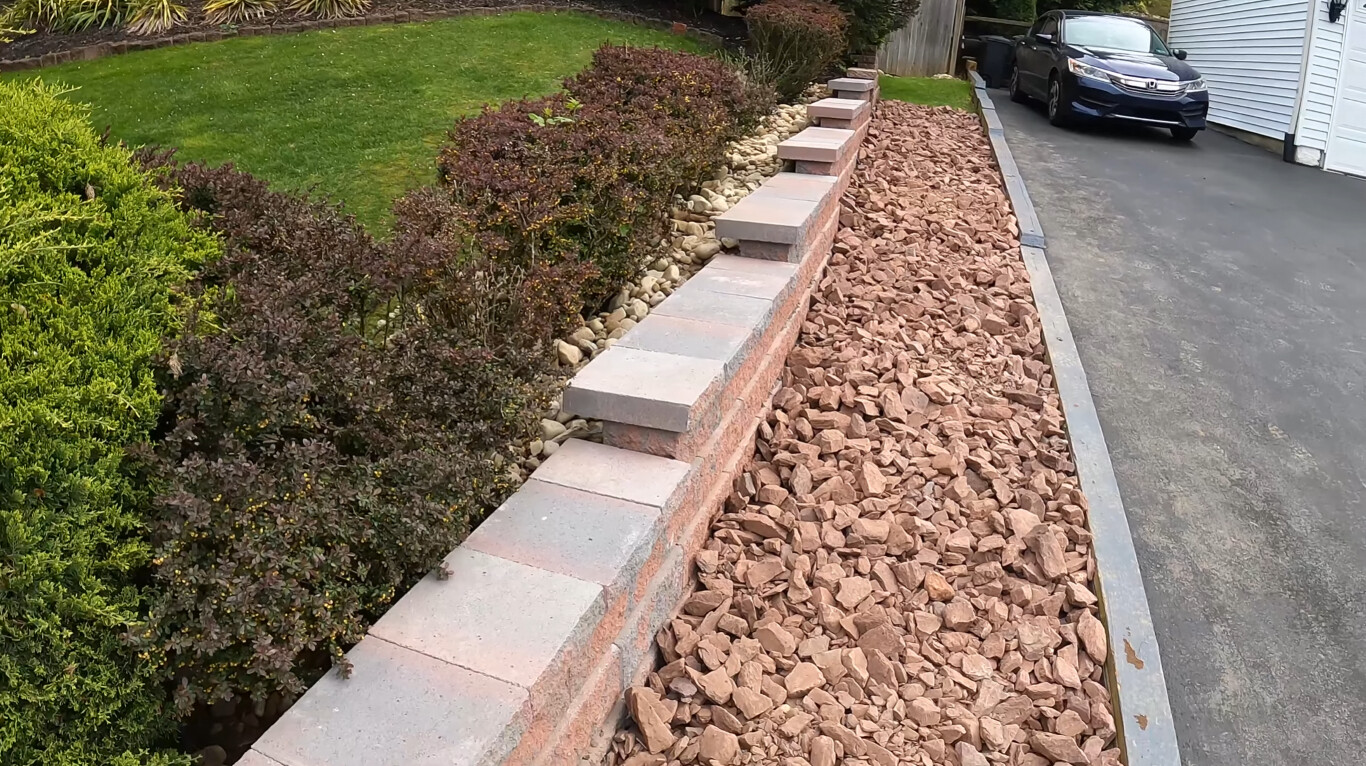 Concrete retaining wall and steps construction