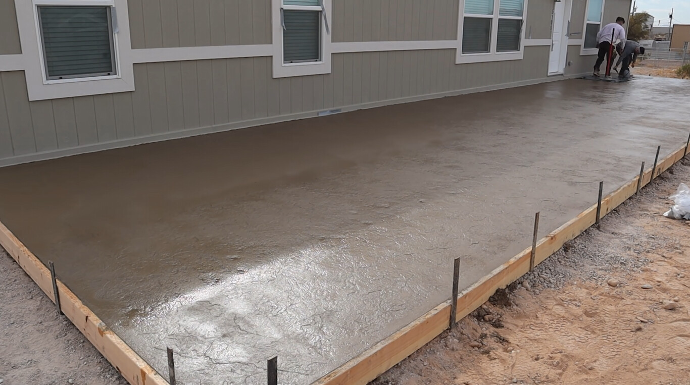 Fresh concrete slab installation for residential property